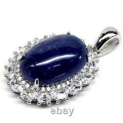 10 X 15 MM. Oval Cabochon Blue Heated Sapphire & Simulated Cz Pendant 925 Silver