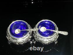 A. Jacobi & Co. Rose Repousse Sterling Silver Pair of Salt Cellars Cobalt Glass