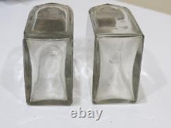 A Pair of Antique Sterling Silver Glass Perfume Bottles