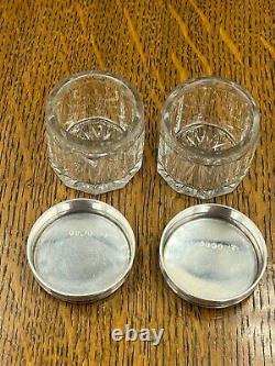 A pair of victorian sterling silver topped glass rouge trinket jars London 1864