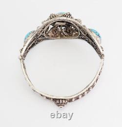 Antique ornate filigree sterling silver and blue glass bracelet