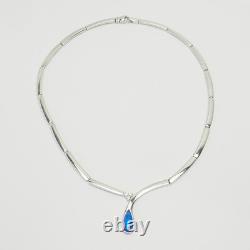 Elegant modern sterling silver links and blue glass drop necklace