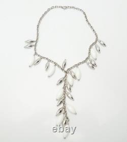 Elegant sterling silver white glass lariat dangle necklace by Angelique de Paris