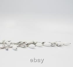 Elegant sterling silver white glass lariat dangle necklace by Angelique de Paris