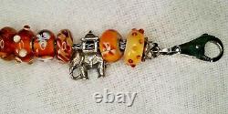 Excellent condition! TROLLBEADS Sterling & Glass Charm Bracelet-Royal Red/Amber