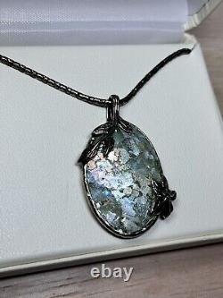 Israel Roman Glass Pendent with sterling silver chain 18inch 925. Retails $350