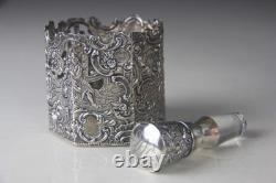 Mauser Sterling Silver Overlay Etched Glass Decanter Read