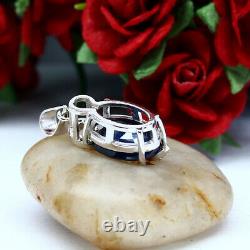 NATURAL 9 X 12 mm. OVAL BLUE SAPPHIRE & WHITE CZ PENDANT 925 STERLING SILVER