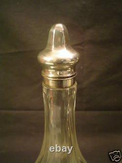 Pair American Engraved Cut Glass Bottles, Sterling Silver Tops, c. 1900