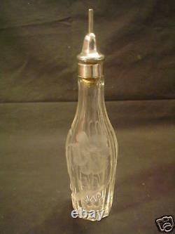Pair American Engraved Cut Glass Bottles, Sterling Silver Tops, c. 1900