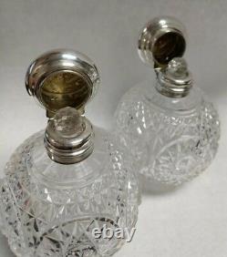 Pair of 1905 Henry Matthews Sterling Silver Cherub Cut Glass Perfume Bottles