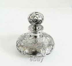 Perfume bottle with crystal and sterling silver overlay in floral design