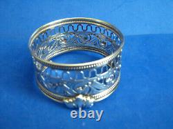ROUND CUT GLASS OPEN SALT CELLAR in STERLING SILVER PERFORATED HOLDER, c1910