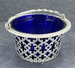 Sterling silver sugar basket with cobalt blue glass liner Birmingham 1904