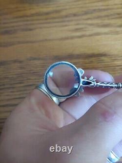 Vintage sterling silver roses magnifying glass pendant