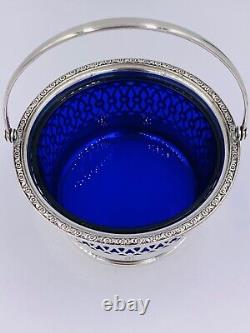 Webster Sterling Silver Reticulated Basket, Blue Glass Liner Swing handle